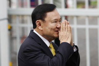 L'ex-Premier ministre thaï Thaksin Shinawatra a son arrivée à la Cour suprême, à Bangkok. KEYSTONE/EPA/RUNGROJ YONGRIT